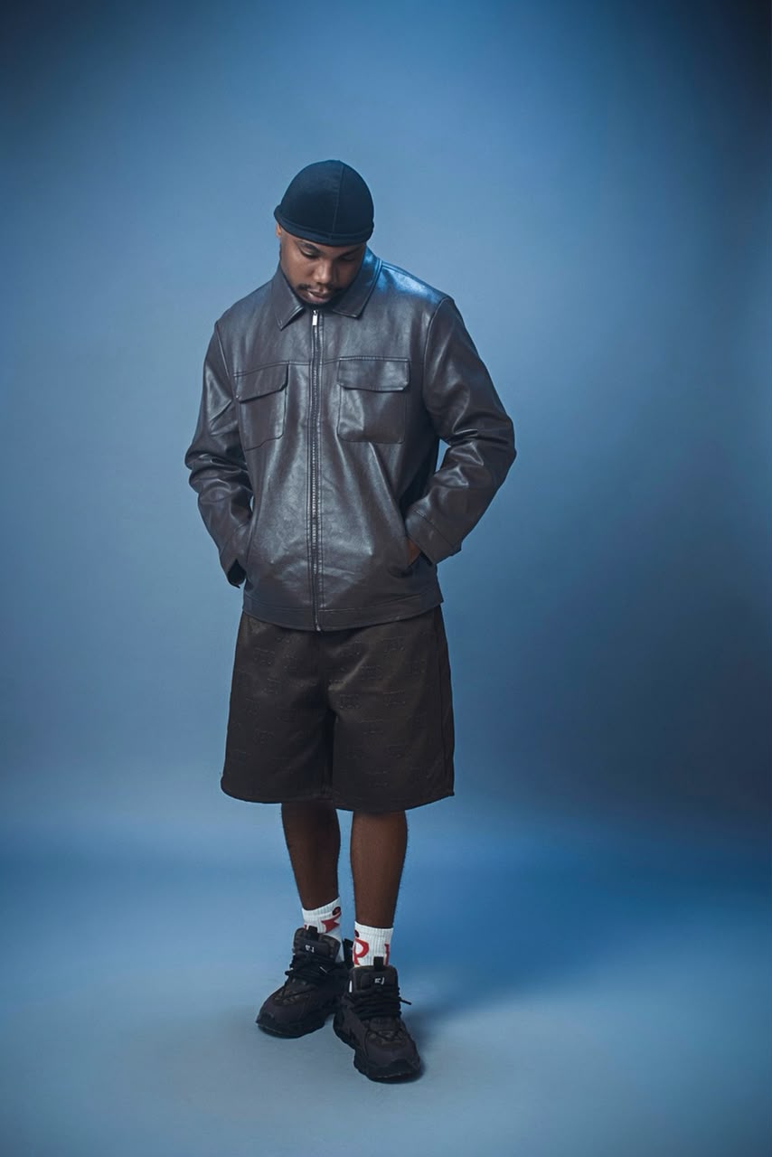 H3RITAGE — Full-Length Studio Portrait H3RITAGE full-length studio portrait in a black leather jacket — official promotional photograph